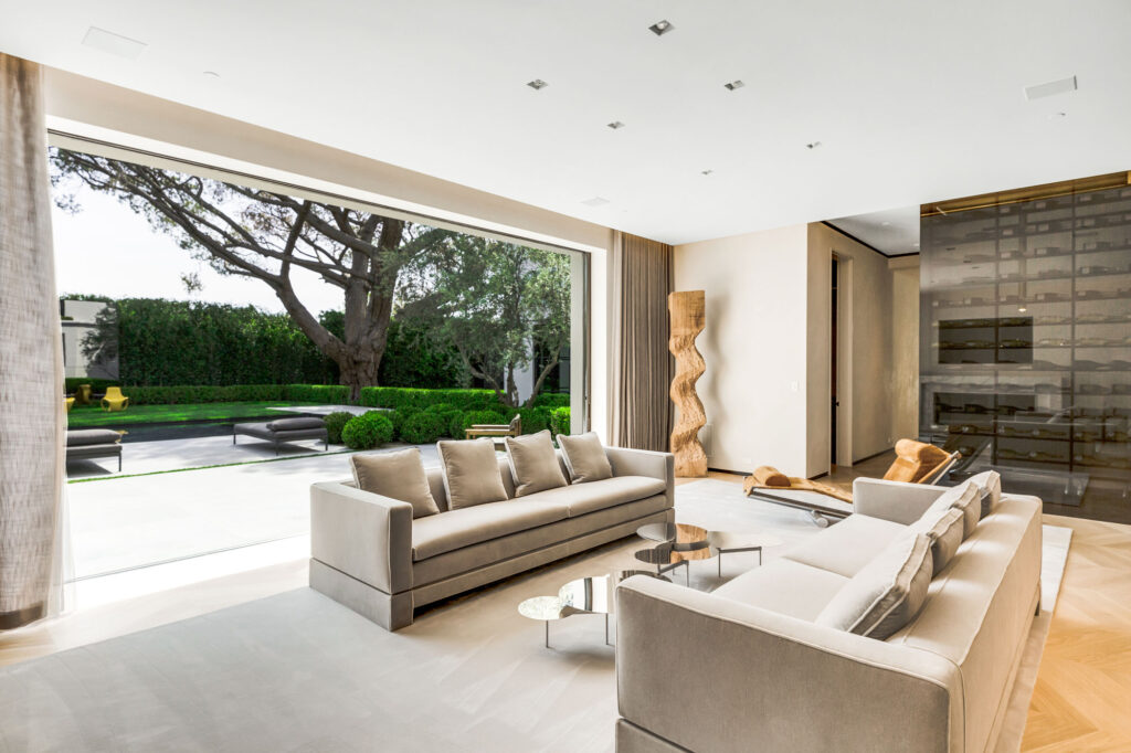 Contemporary Living Room with Retractable Wall by NXT Level